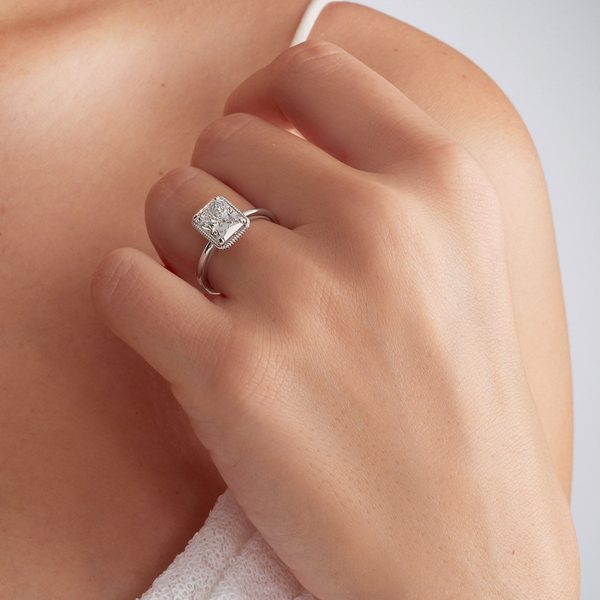 Milgrain Solitaire Long Radiant Engagement Ring in White Gold