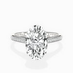 Channel Set Solitaire Oval Engagement Ring in White Gold