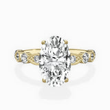 Vintage Solitaire Oval Engagement Ring in Yellow Gold