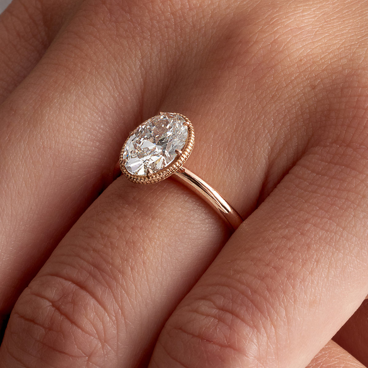 Milgrain Solitaire Oval Engagement Ring in Rose Gold