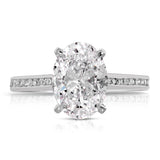 Channel Set Solitaire Oval Engagement Ring in White Gold