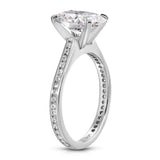 Channel Set Solitaire Oval Engagement Ring in White Gold