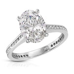 Channel Set Solitaire Oval Engagement Ring in White Gold