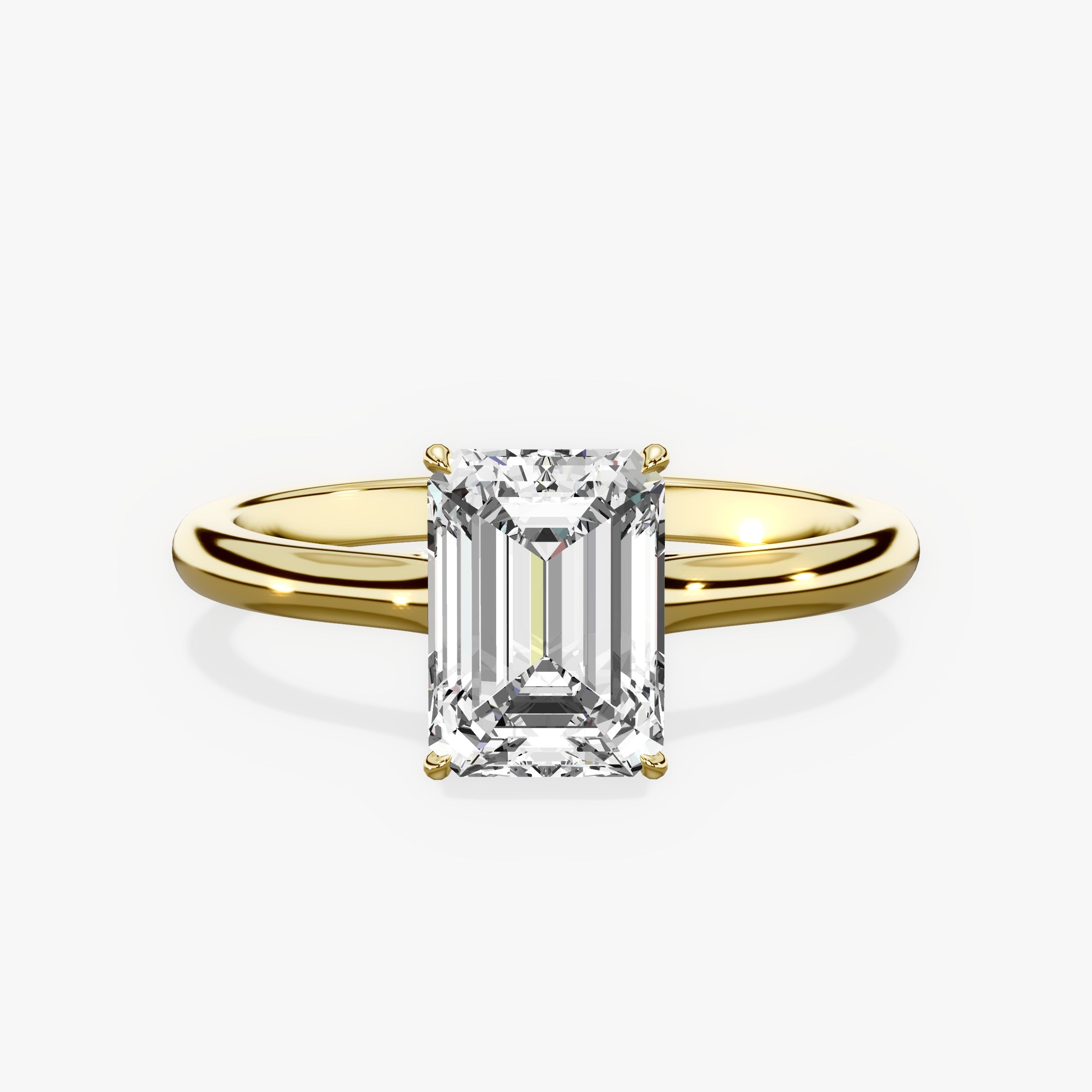 Gala Solitaire Emerald Engagement Ring in Yellow Gold