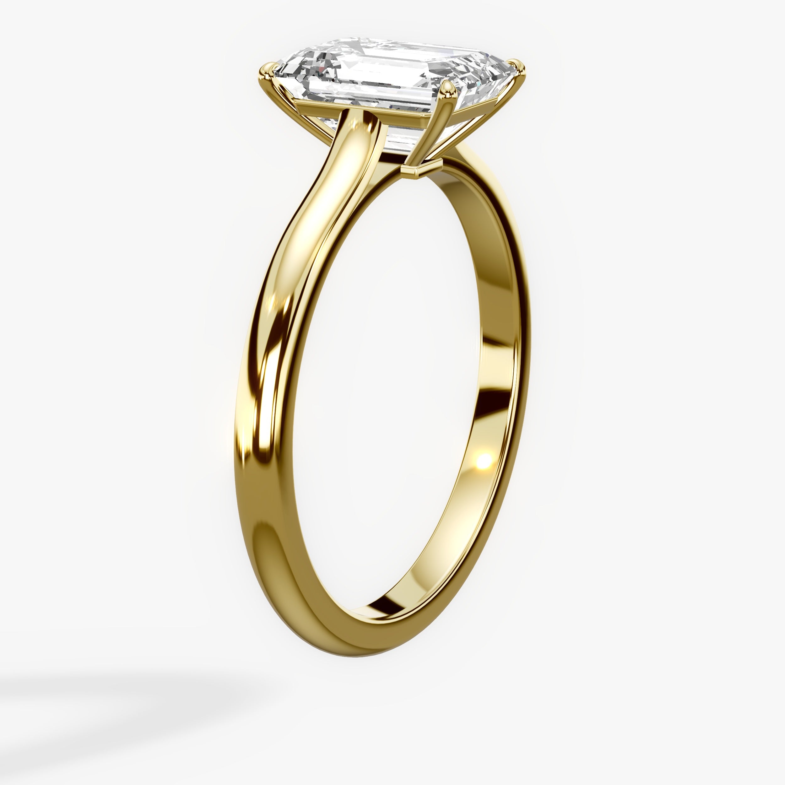 Gala Solitaire Emerald Engagement Ring in Yellow Gold