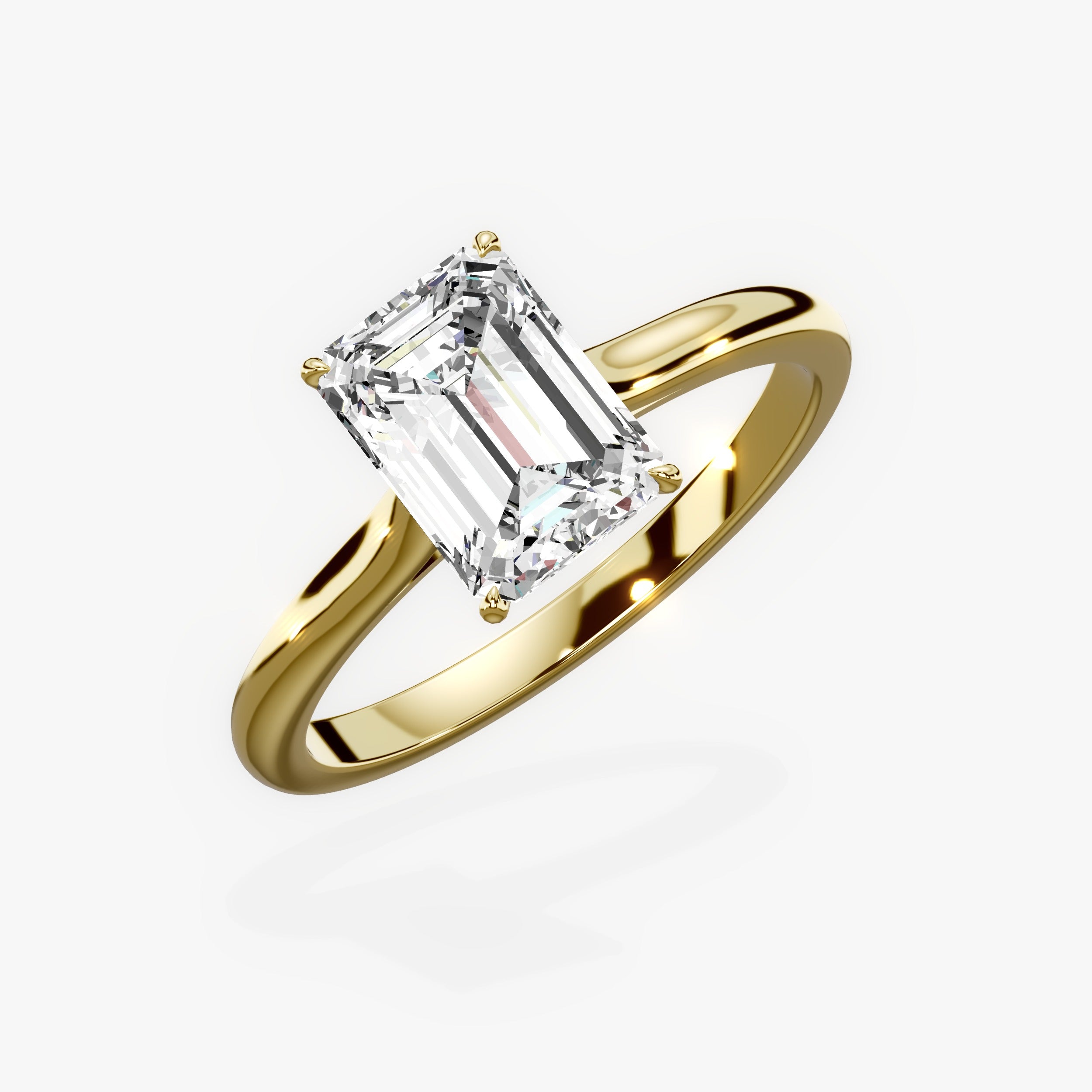 Gala Solitaire Emerald Engagement Ring in Yellow Gold