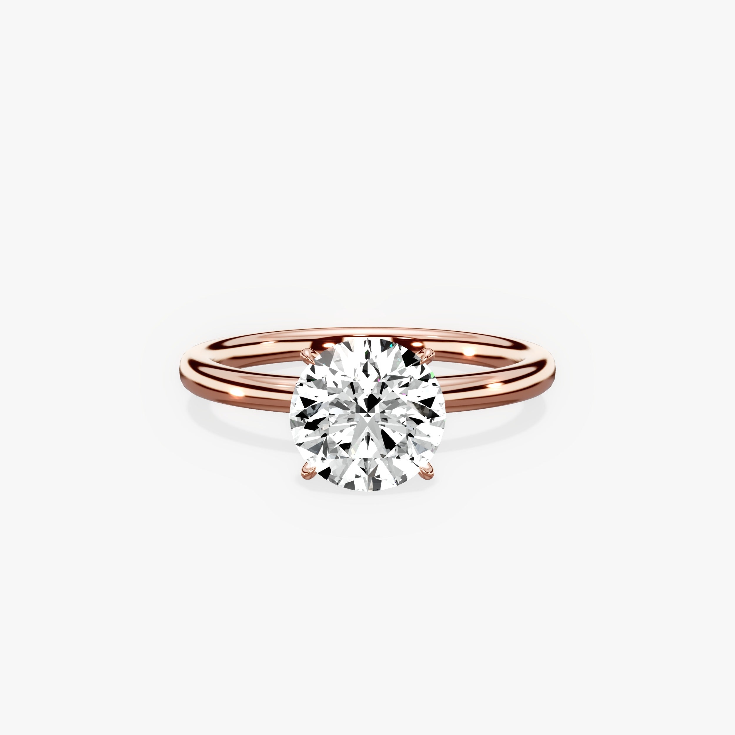 Paris Solitaire Round Engagement Ring in Rose Gold