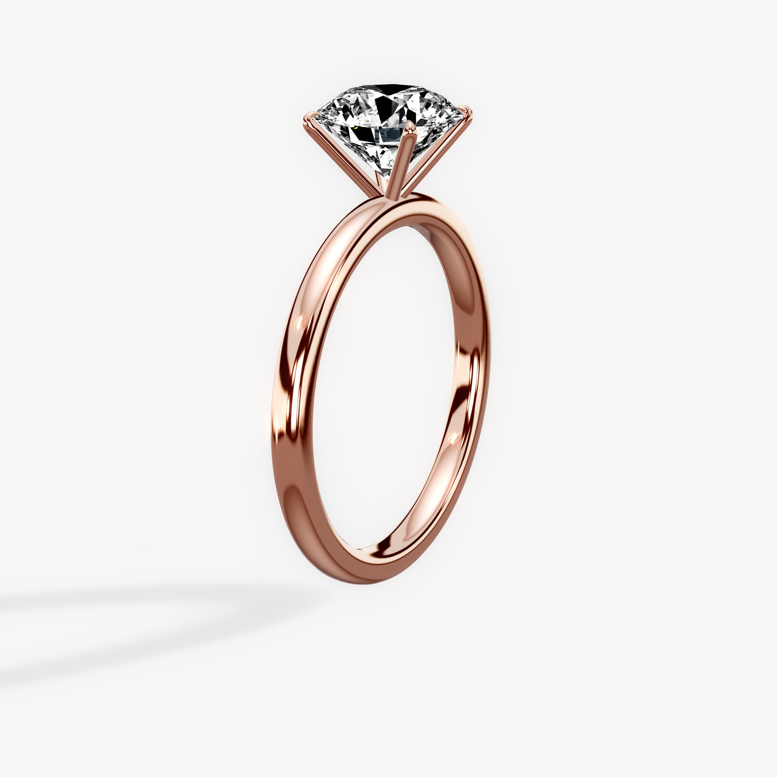 Paris Solitaire Round Engagement Ring in Rose Gold