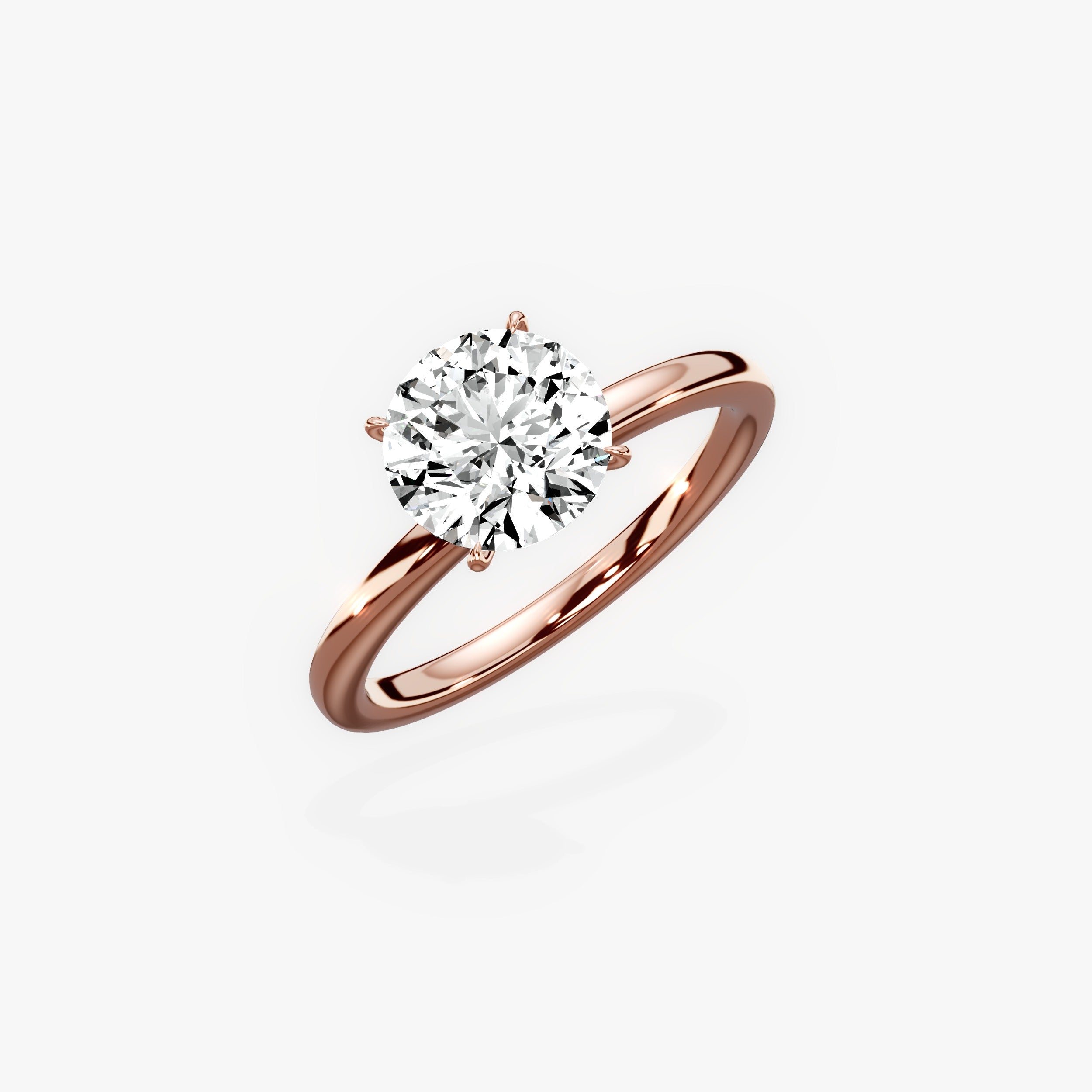 Paris Solitaire Round Engagement Ring in Rose Gold