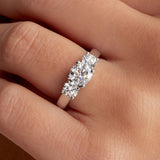 Signiture Three Stone Round Engagement Ring in White Gold