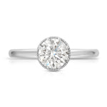 Romantic Solitaire Round Engagement Ring in White Gold