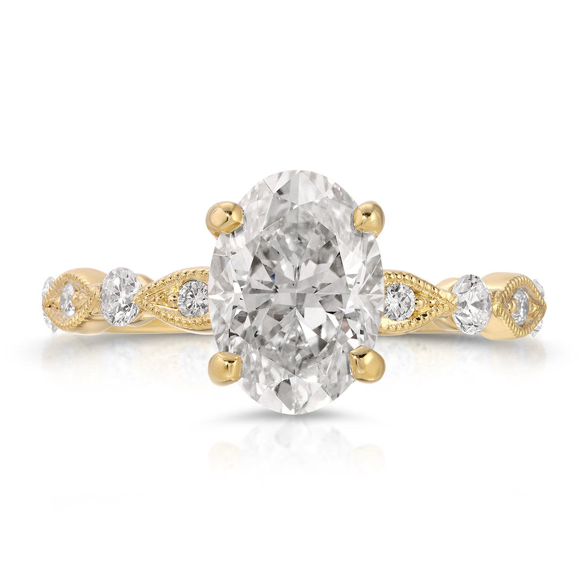 Vintage Solitaire Oval Engagement Ring in Yellow Gold