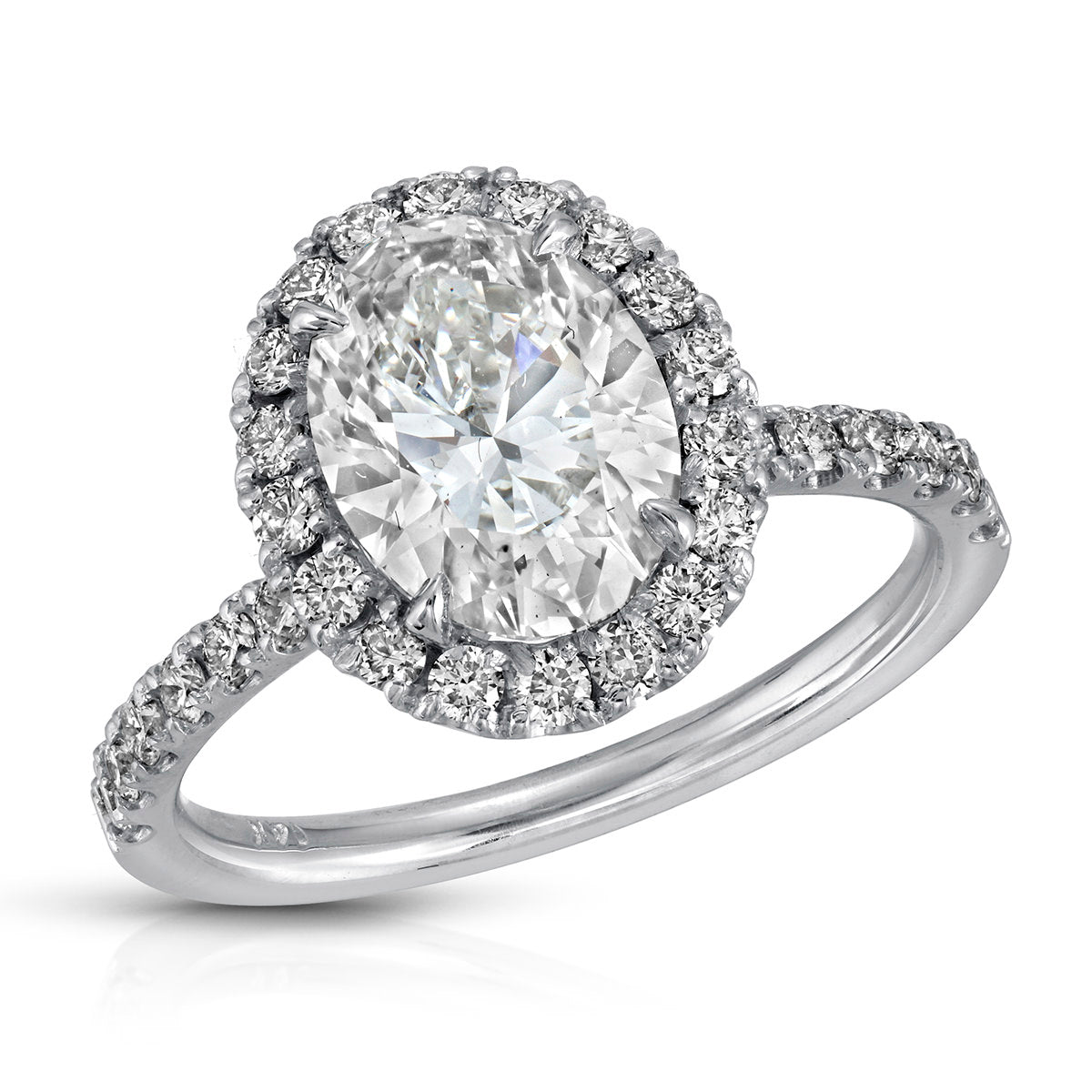 Romantic Halo Oval Engagement Ring in White Gold