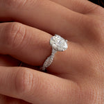 Infinity Hidden Halo Oval Engagement Ring in White Gold