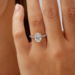 Fortuna Hidden Halo Oval Engagement Ring in White Gold