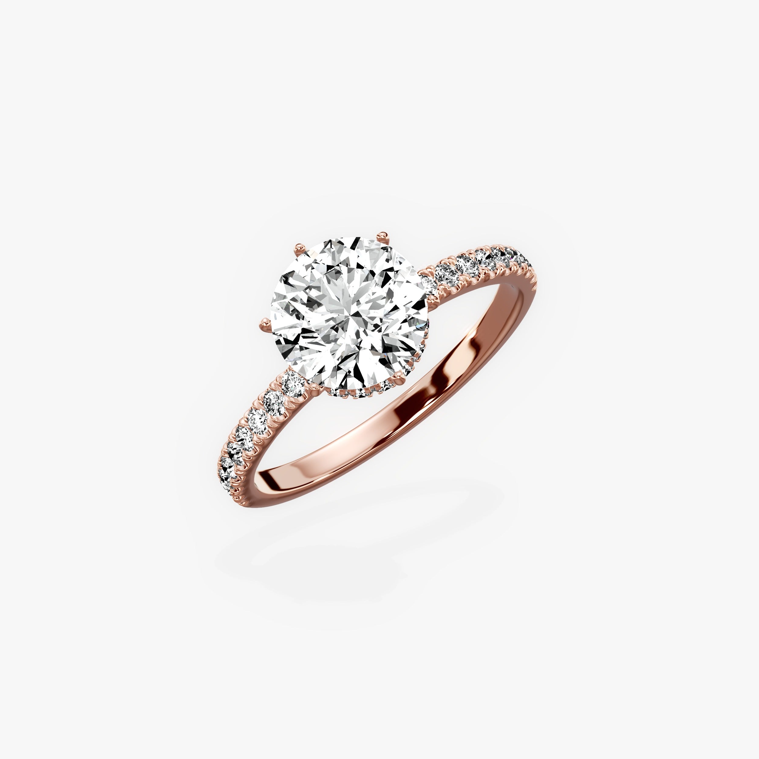 Rose Hidden Halo Round Engagement Ring in Rose Gold