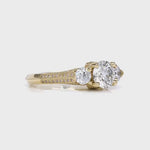 Heirloom Three Stone Round Engagement Ring in Yellow Gold