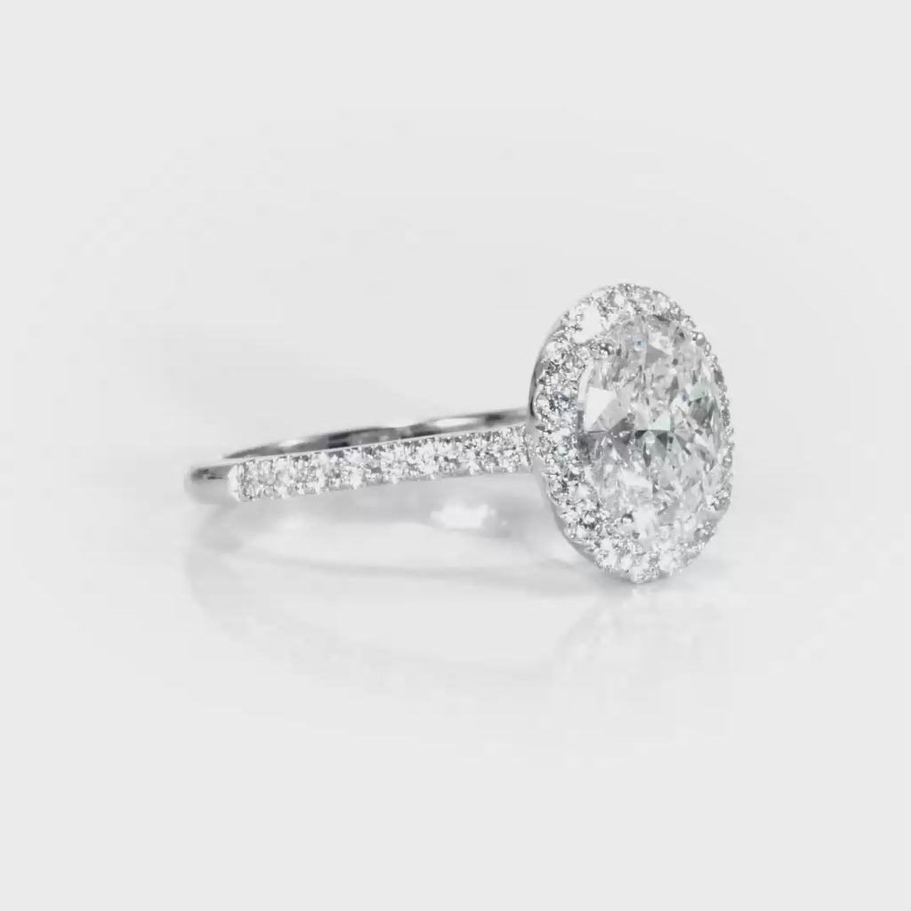 Classic Halo Cathedral Oval Engagement Ring in White Gold