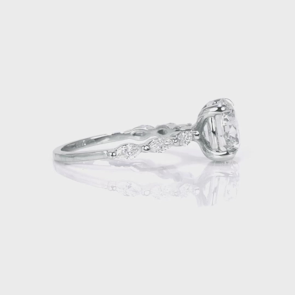 Marquise Solitaire Round Engagement Ring in White Gold