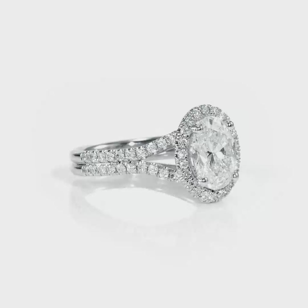 Split Shank Hidden Halo Oval Engagement Ring in White Gold