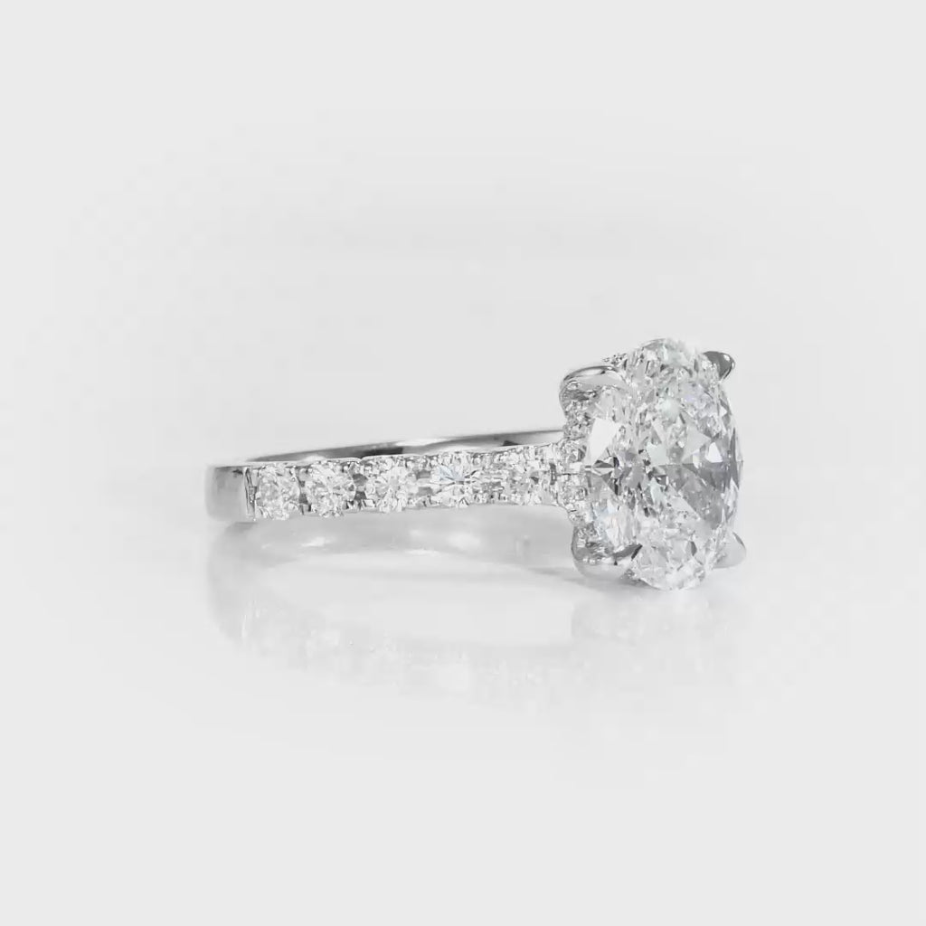 Timeless Hidden Halo Oval Engagement Ring in White Gold