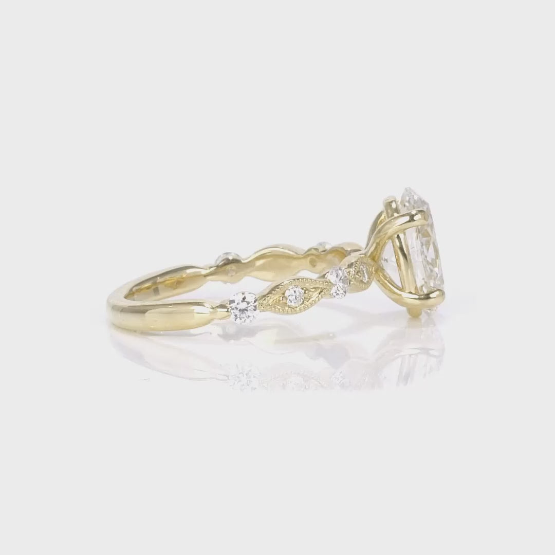 Vintage Solitaire Oval Engagement Ring in Yellow Gold