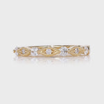 Floating Diamonds Wedding Band in Yellow Gold