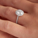 Classic Halo Cathedral Oval Engagement Ring in White Gold