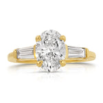 Baguette Three Stone Oval Engagement Ring in Yellow Gold