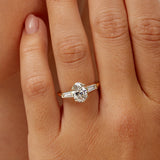 Baguette Three Stone Oval Engagement Ring in Yellow Gold