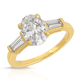 Baguette Three Stone Oval Engagement Ring in Yellow Gold