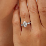 Baguette Three Stone Oval Engagement Ring in White Gold