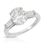 Baguette Three Stone Oval Engagement Ring in White Gold