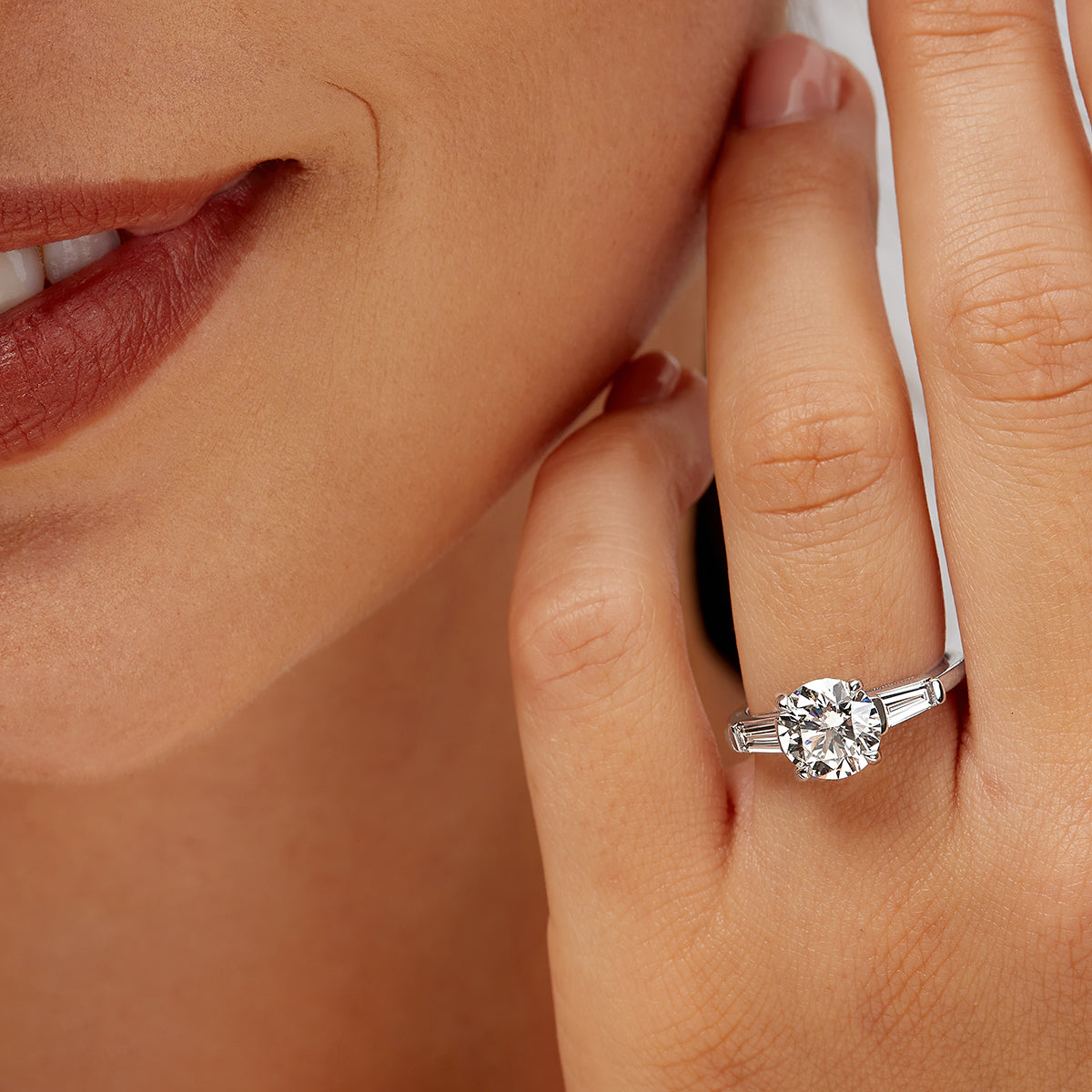 Baguette Three Stone Round Engagement Ring in White Gold