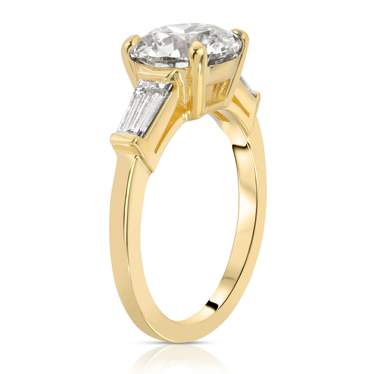 Baguette Three Stone Round Engagement Ring in Yellow Gold