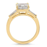 Baguette Three Stone Emerald Engagement Ring in Yellow Gold