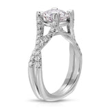 Irresistible Solitaire Round Engagement Ring in White Gold