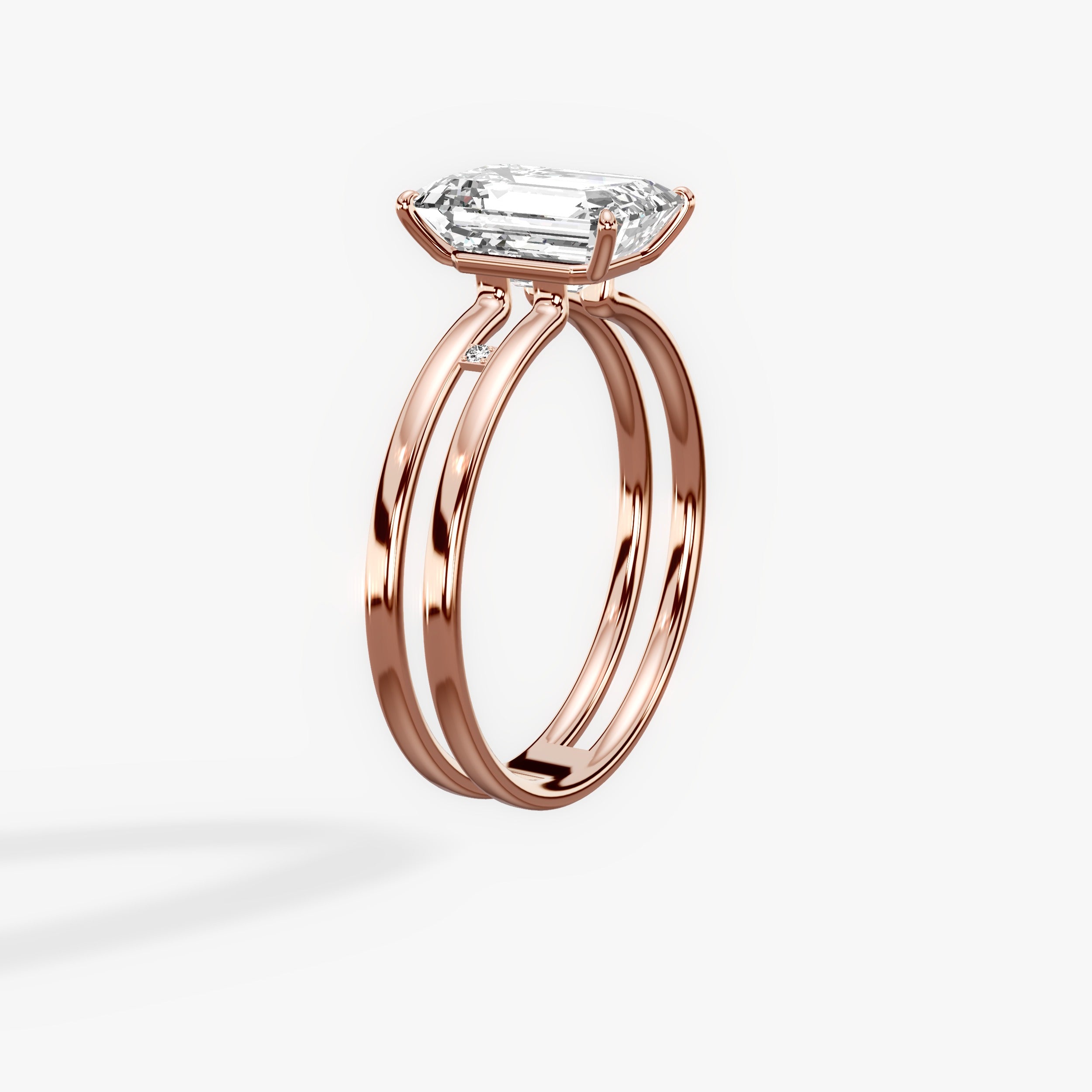 Parallels Emerald Engagement Ring in Rose Gold