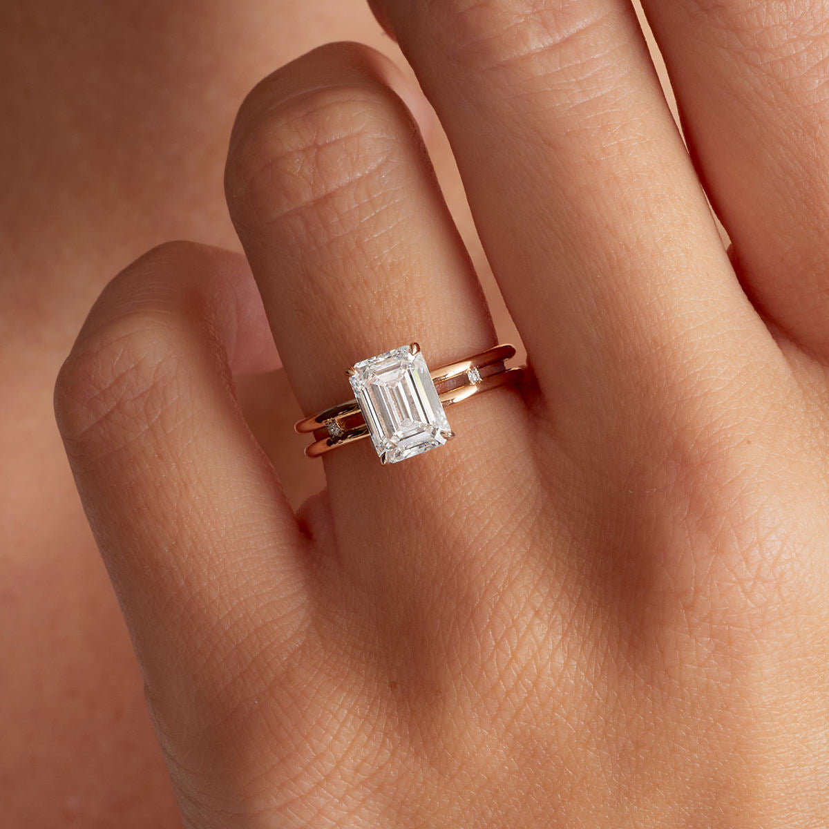 Parallels Emerald Engagement Ring in Rose Gold